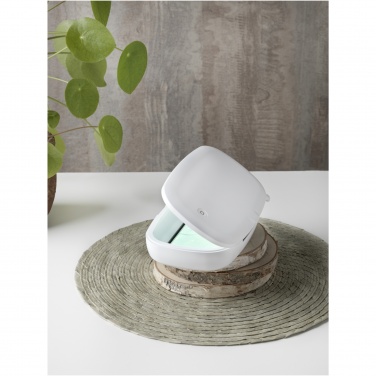 Logotrade advertising product image of: Capsule UV smartphone sanitizer with 5W wireless charging pad